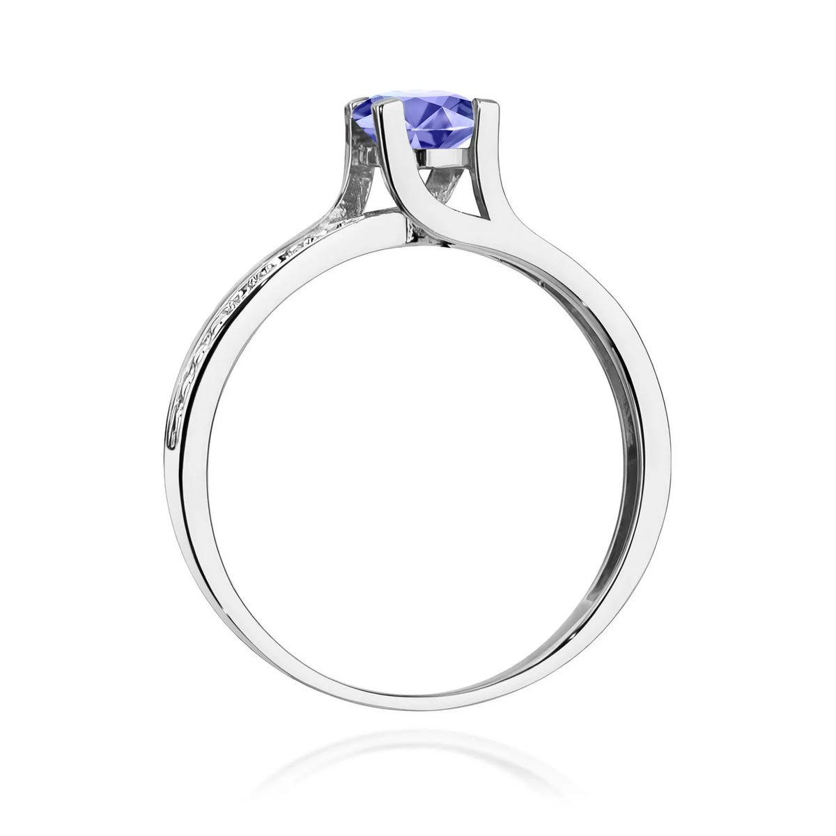 Halo prsteň z bieleho 14k zlata s okrúhlym tanzanitom 0,50 ct a diamantmi 0,03 ct