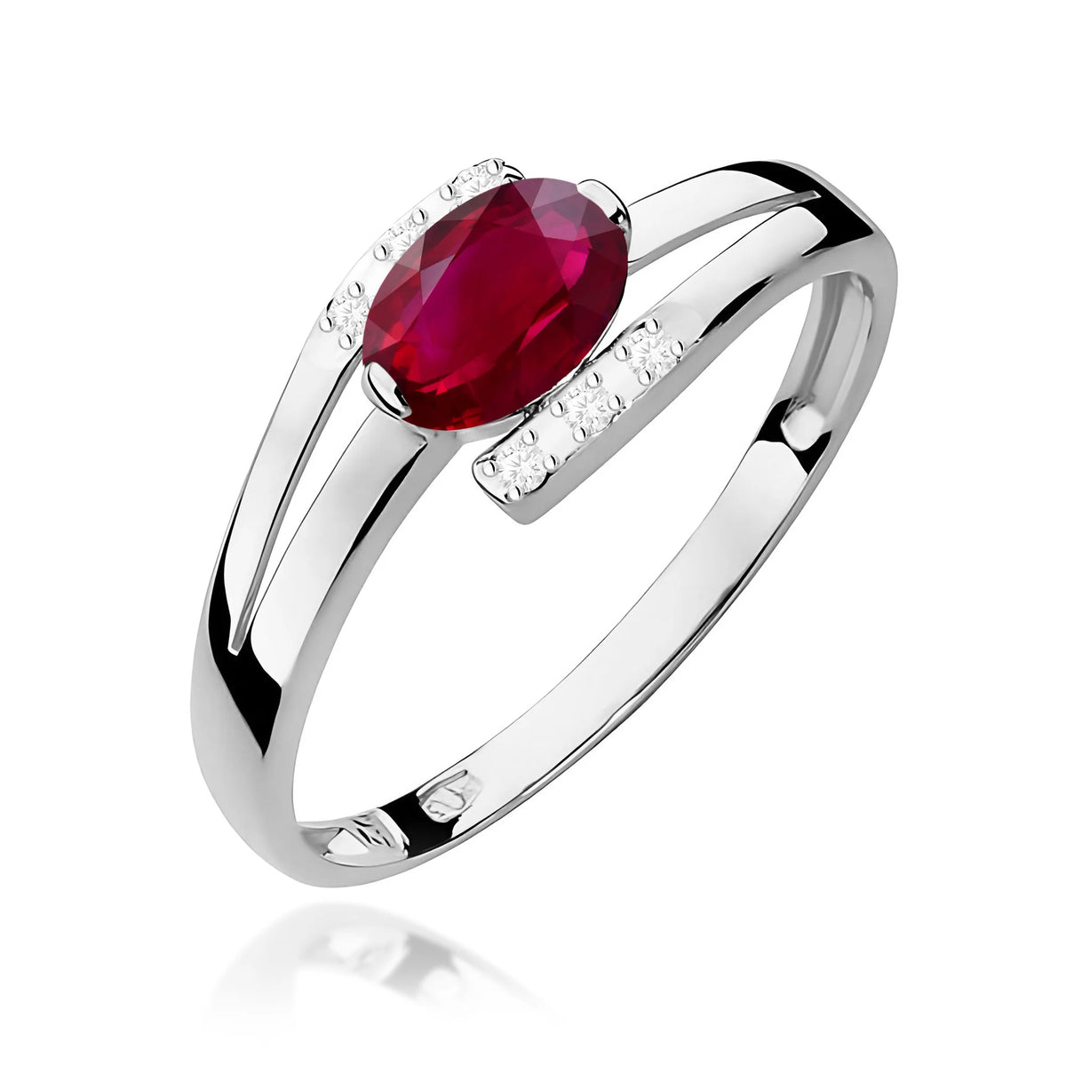 Prsteň z bieleho 14k zlata s oválnym rubínom 0,60 ct a diamantmi 0,052 ct