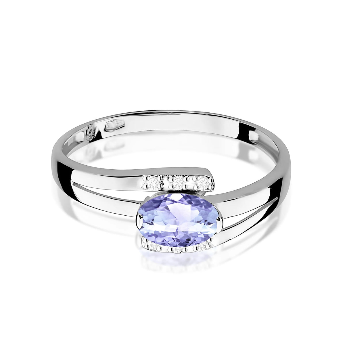 Prsteň z bieleho 14k zlata s oválnym tanzanitom 0,40 ct a diamantmi 0,052 ct