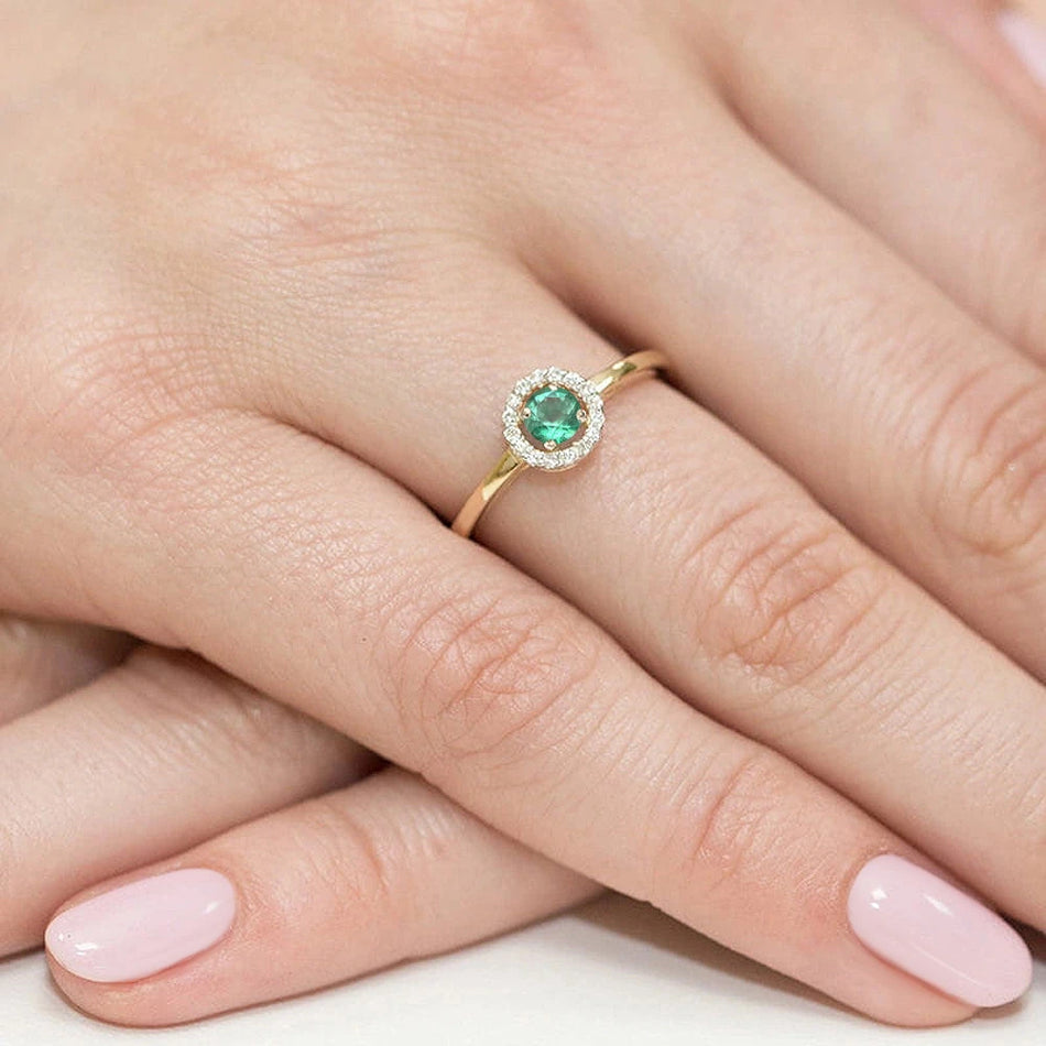 Zlatý prsteň s 0,15 ct smaragdom a 0,08 ct diamantmi