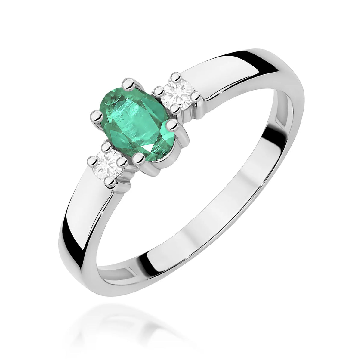 Prsteň s tromi kameňmi z bieleho 14k zlata s oválnym smaragdom 0,40 ct a diamantmi 0,08 ct