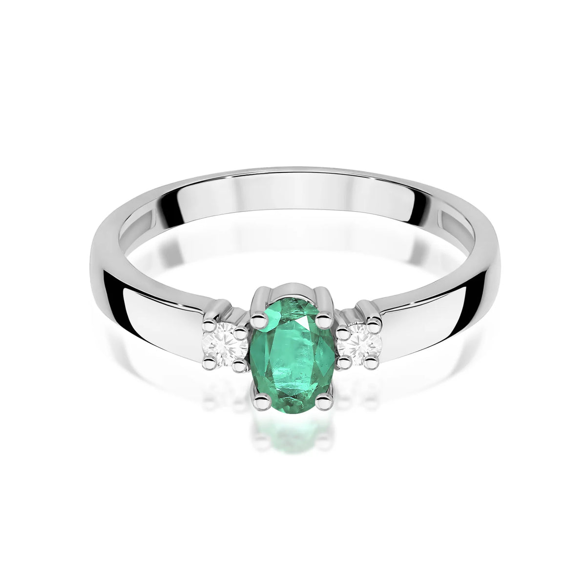 Prsteň s tromi kameňmi z bieleho 14k zlata s oválnym smaragdom 0,40 ct a diamantmi 0,08 ct