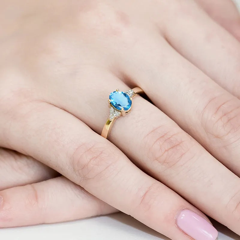 zlatý prsteň s topásom 0,90 ct a diamantmi 0,052 ct w0308-tob-01