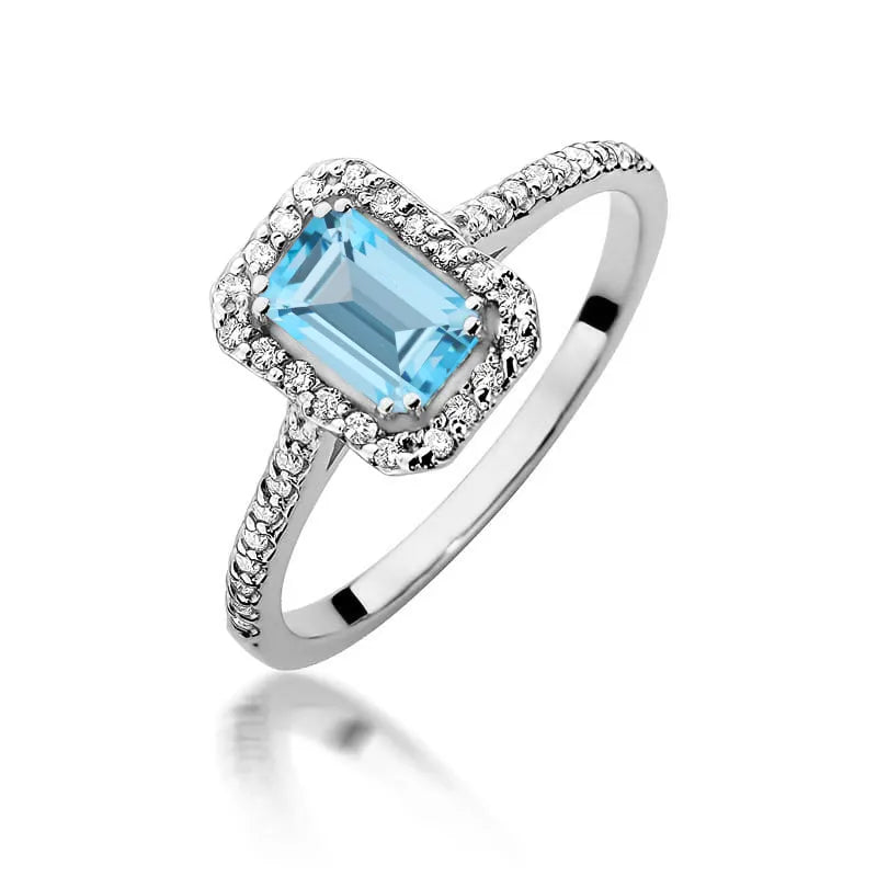zlatý prsteň s topásom 0,65 ct a diamantmi 0,19 ct w0403-tob-01