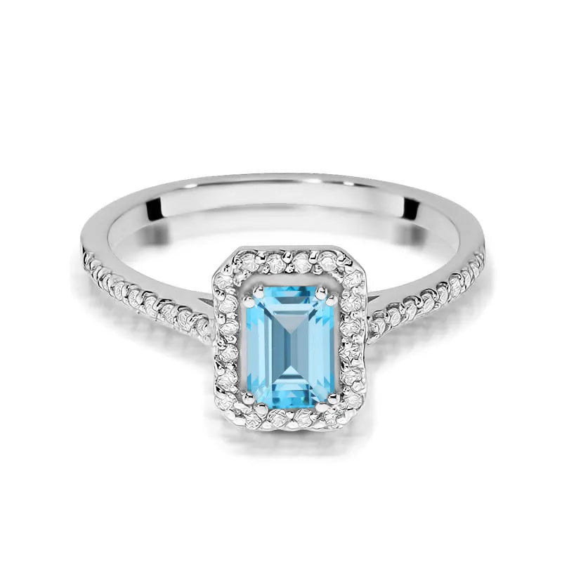 zlatý prsteň s topásom 0,65 ct a diamantmi 0,19 ct w0403-tob-01