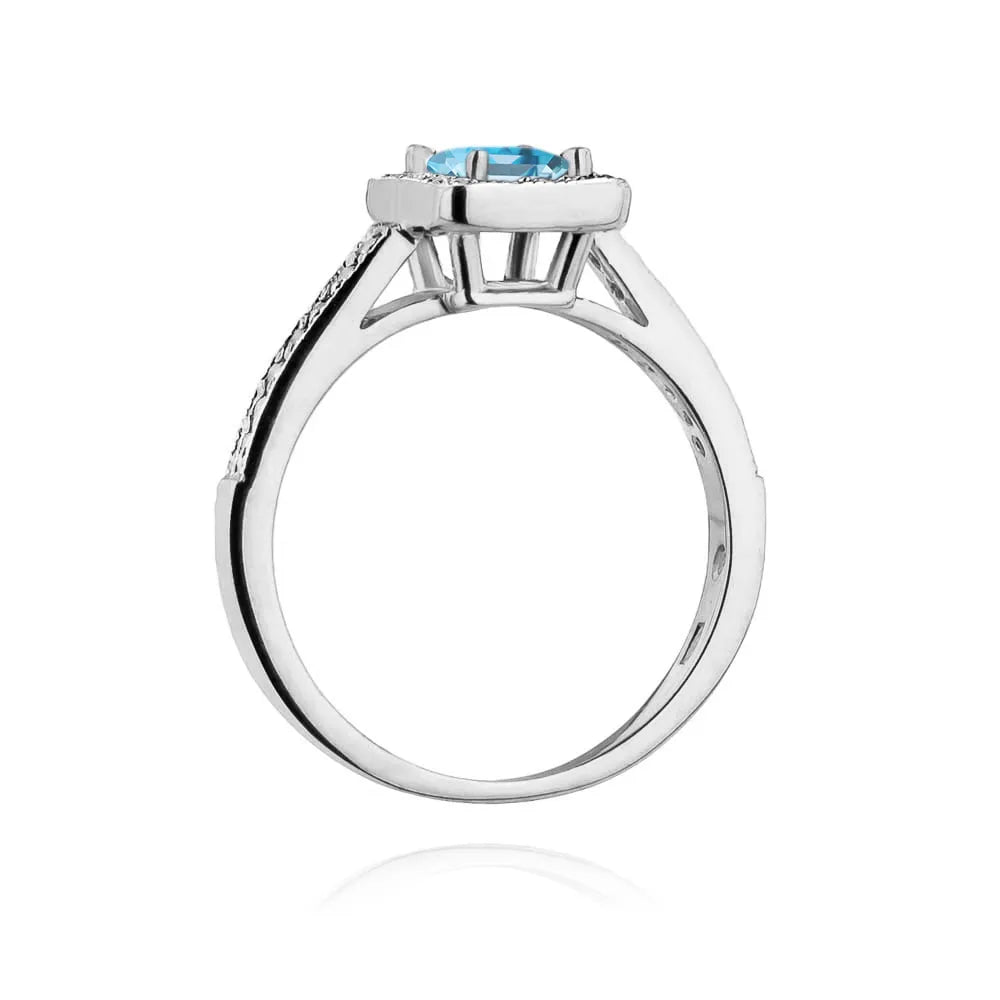 zlatý prsteň s topásom 0,65 ct a diamantmi 0,19 ct w0403-tob-01