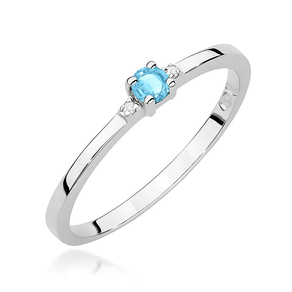 Prsteň z bieleho zlata s 0,15 ct švajčiarskym modrým topásom a 0,01 ct diamantmi