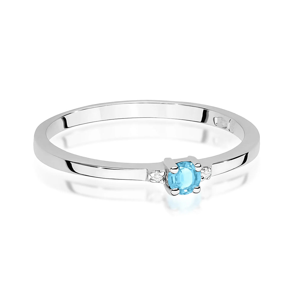 Prsteň z bieleho zlata s 0,15 ct švajčiarskym modrým topásom a 0,01 ct diamantmi