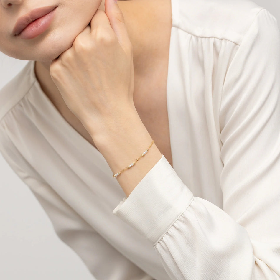 Gold 14k(585) bracelet with pearls and diamond cut beads. Order gift for mother, girlfriend or fiancee.