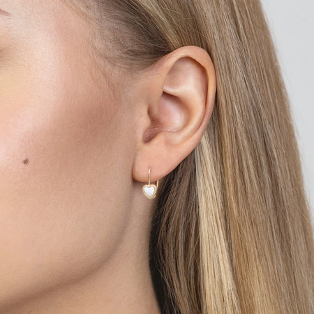 These heart shaped 14-carat gold earrings are an exclusive accessory. Our earrings are a stud clasp. Earrings are packaged in elegant box, perfect for a gift