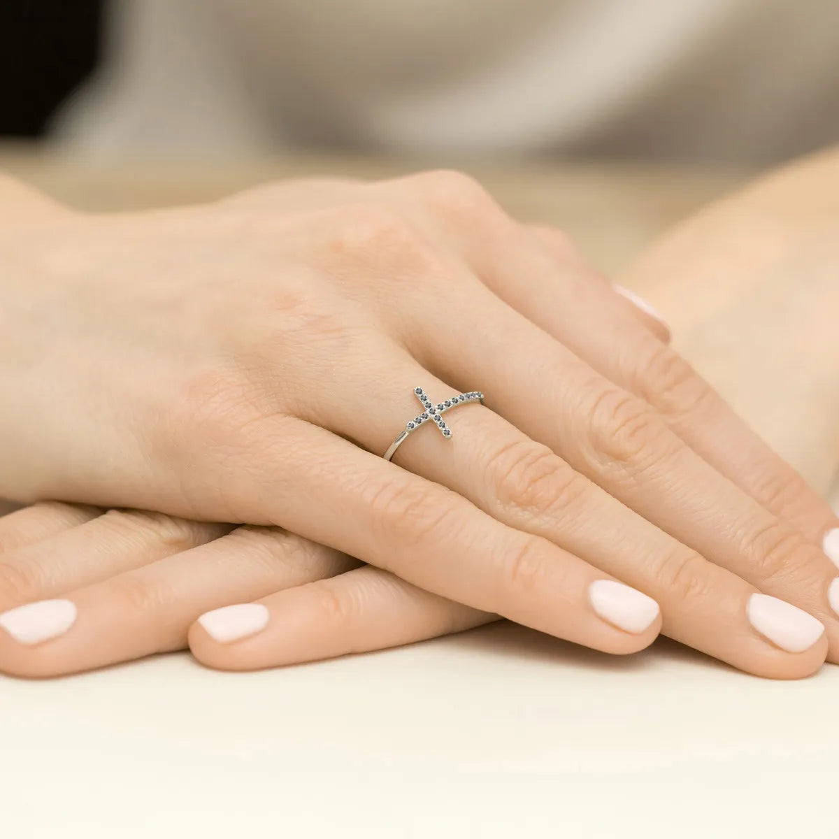 White gold ring with cross made from 0.09ct black diamonds