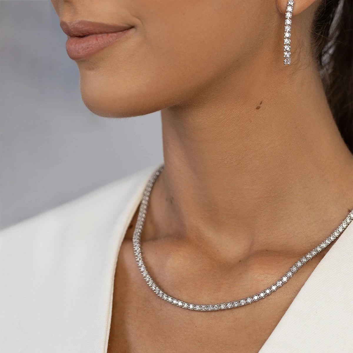 This 14-carat gold necklace with 115 0.06ct diamonds embodies timeless beauty . Perfect for a gift.